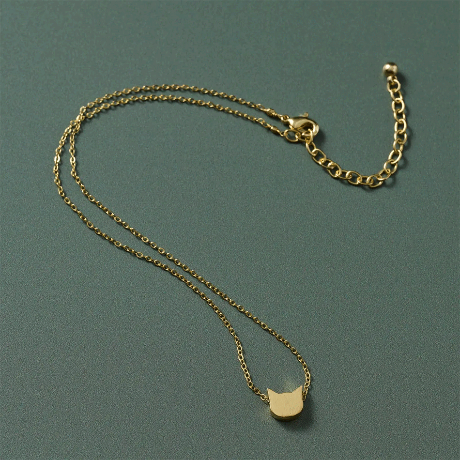 Fair trade gold cat face necklace