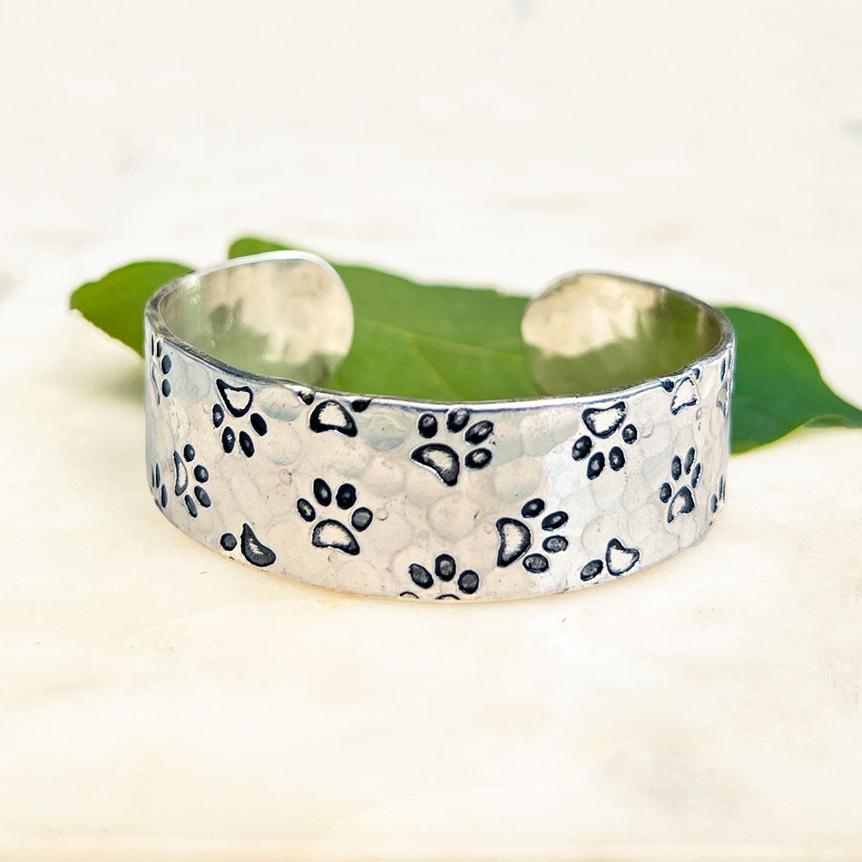 Fair trade paw print silver cuff