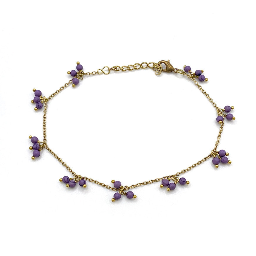 Fair trade anklet handmade by survivors of human trafficking.