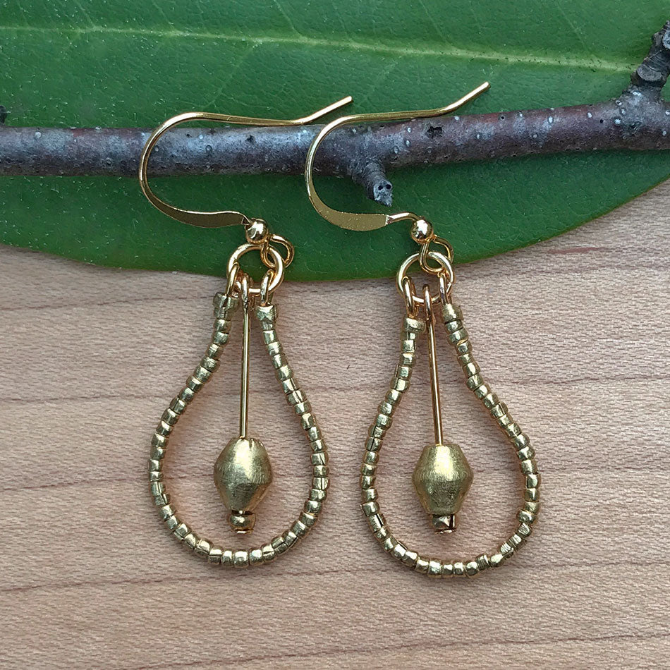 Fair trade brass earrings handmade by women in Ethiopia